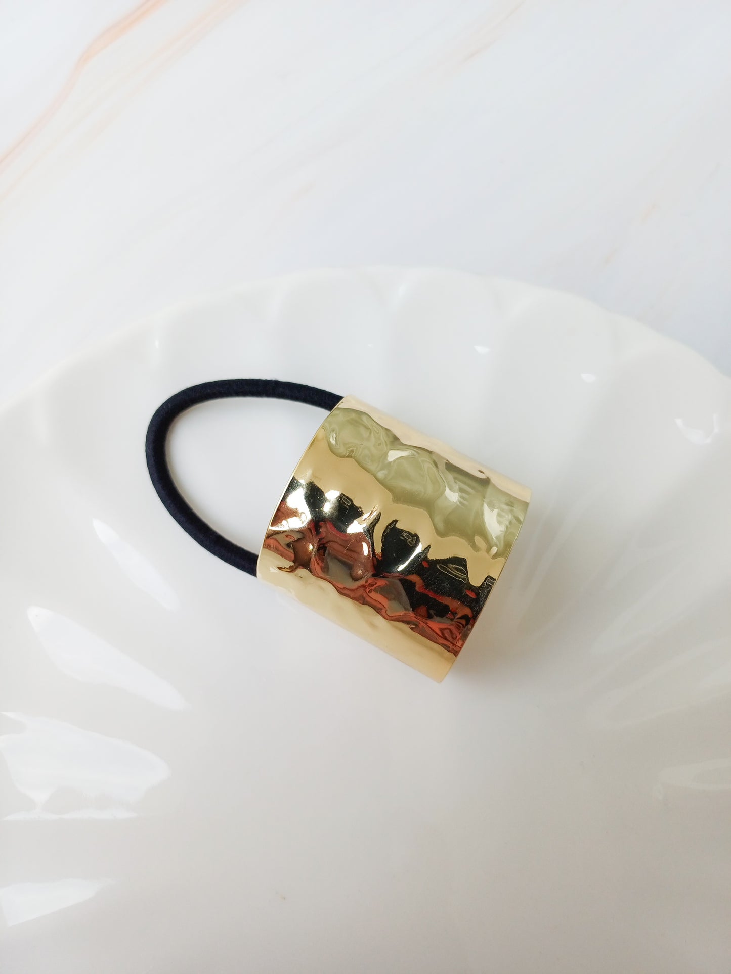 PONY CUFF