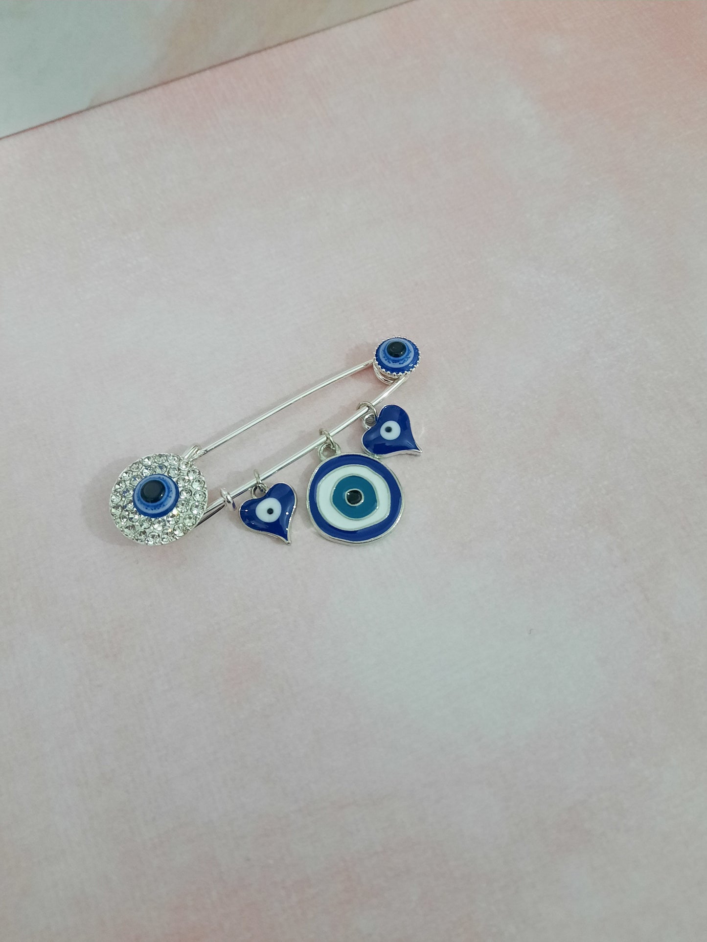 PRENDEDOR OJO TURCO